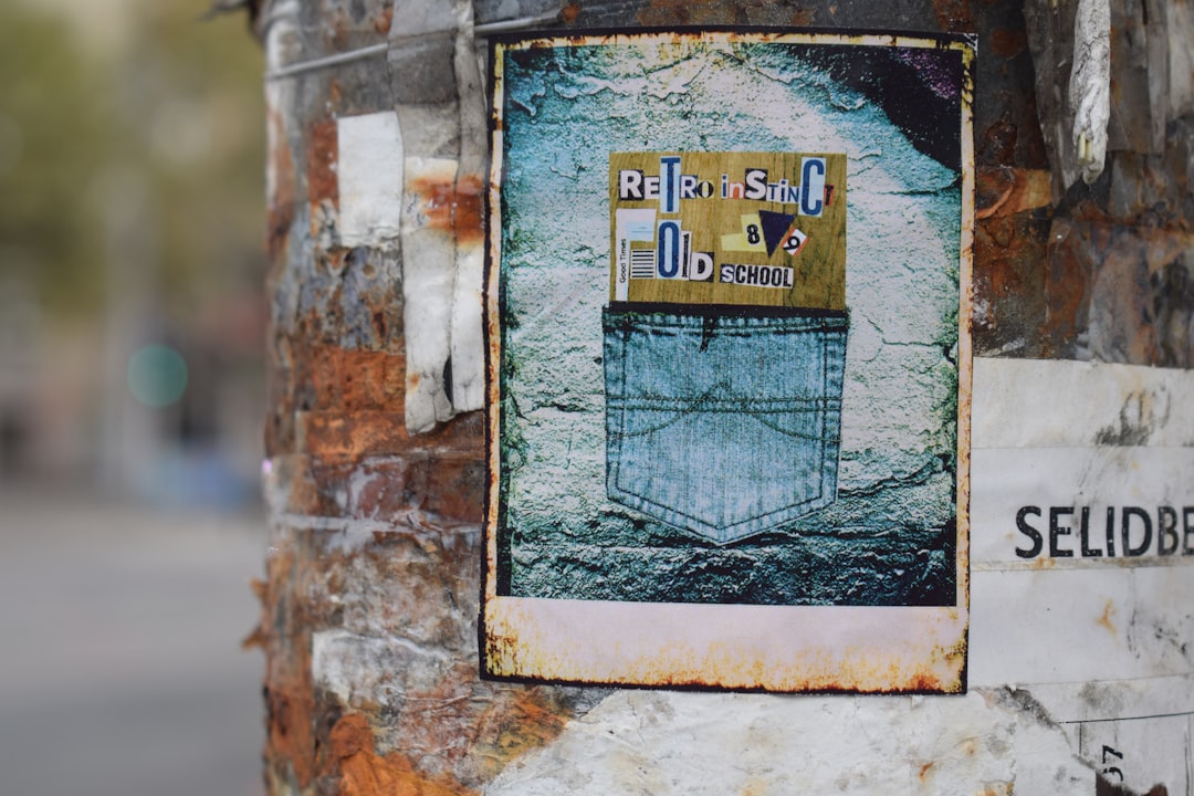 Graffiti art of a denim pocket on a pole.