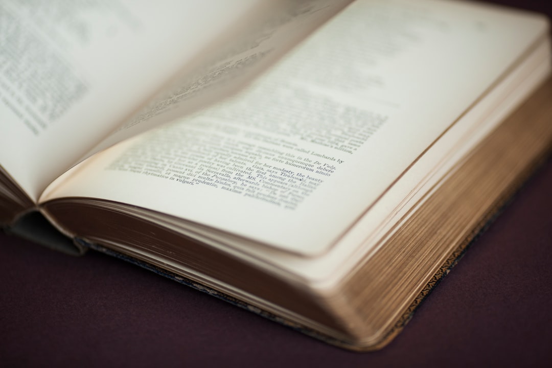 white book page on brown wooden table