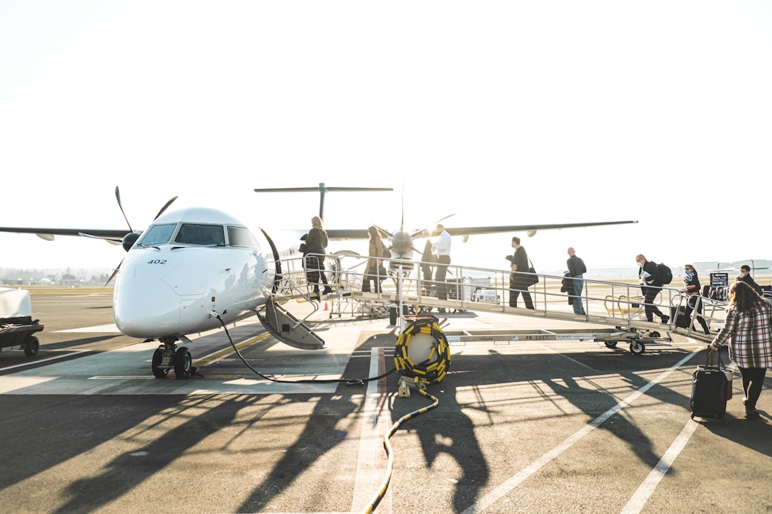 people boarding a plane