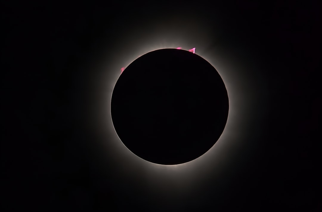 A solar eclipse seen in the dark sky