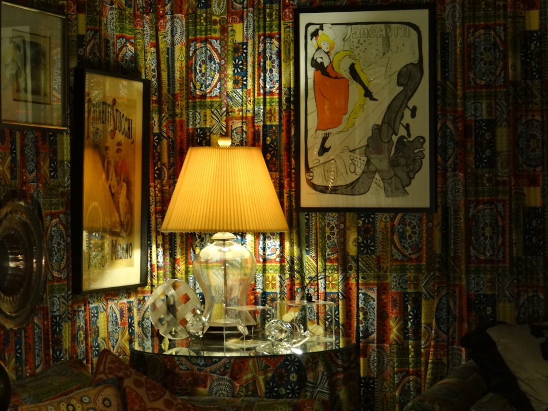 A living room filled with furniture and a lamp